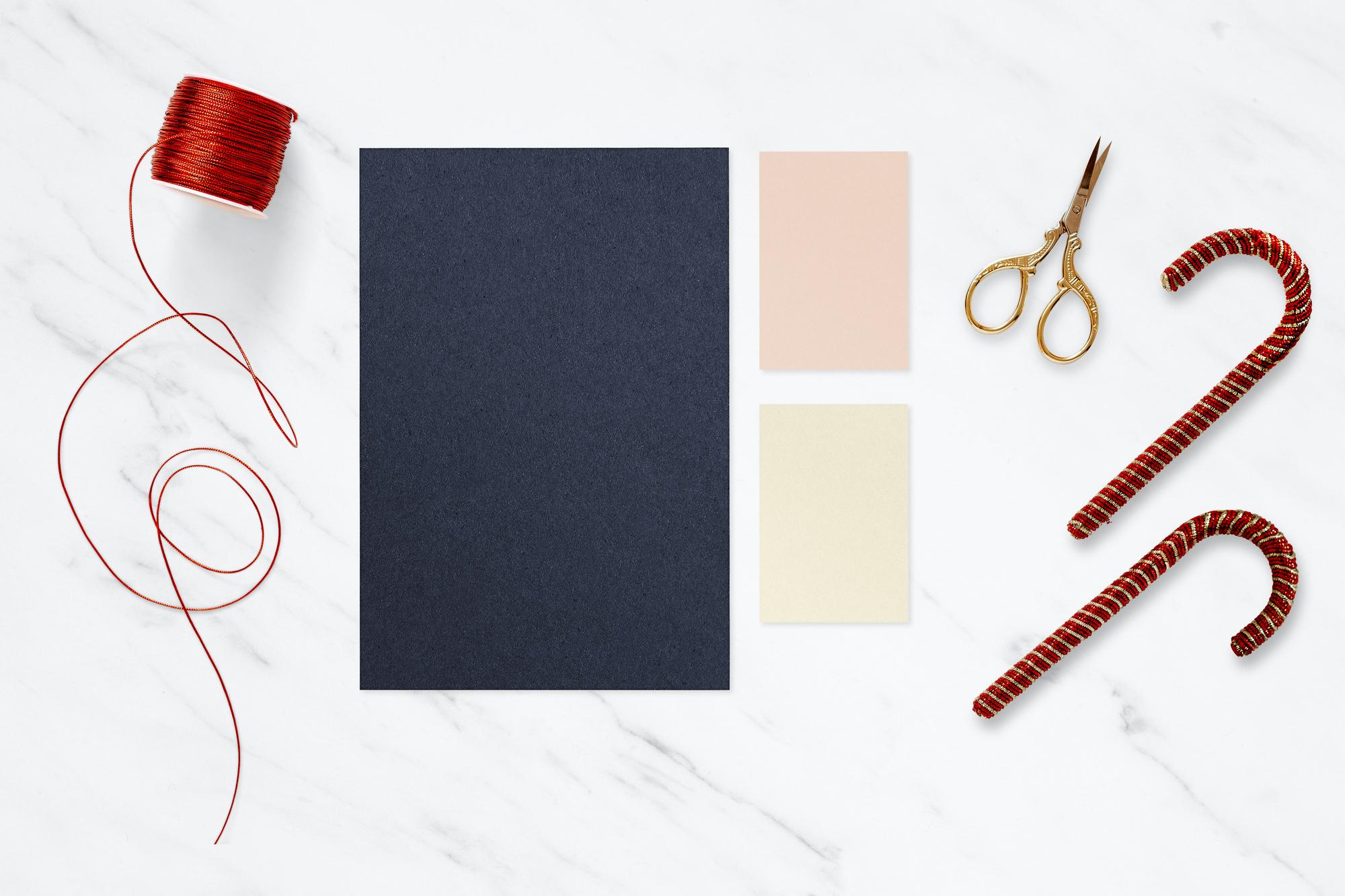 flat lay of embroidered swatches and thread cards